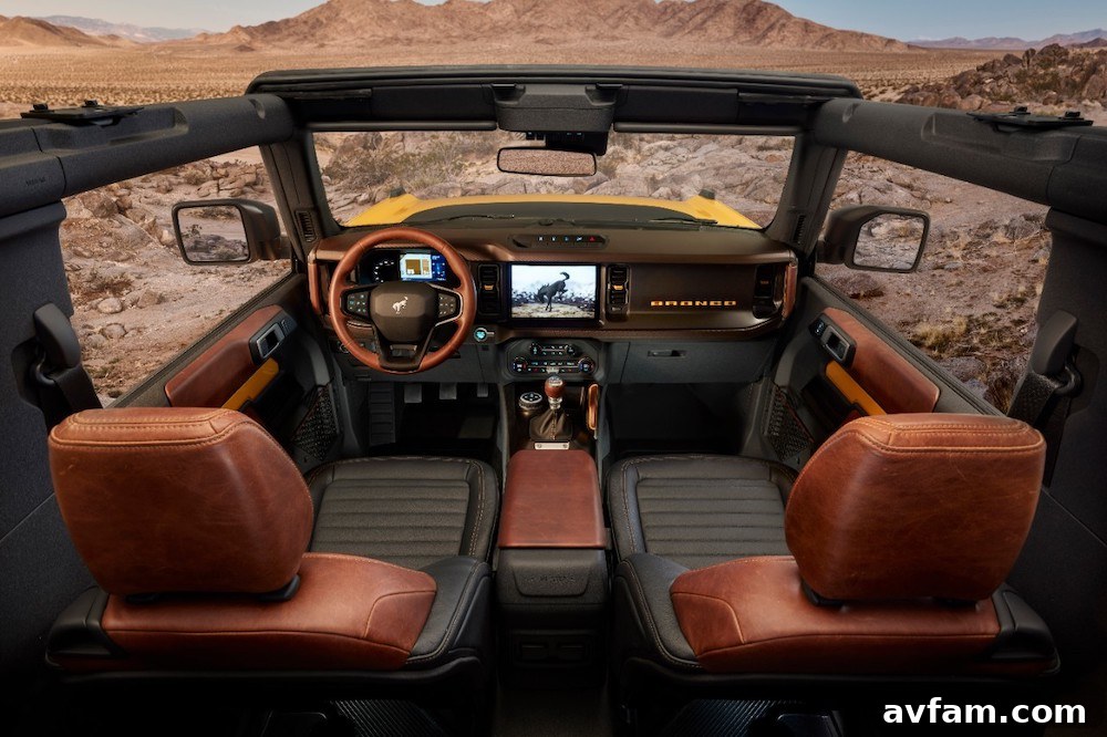 The Ford Bronco navigating a water crossing with ease.
