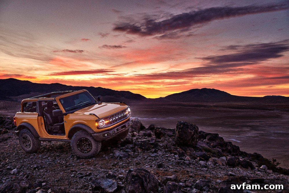 A low-angle shot of the Ford Bronco's suspension and large tires.