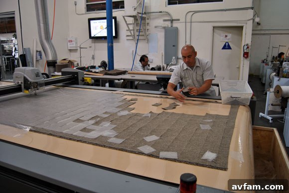 Fabric cutting machine preparing samples for Thrive Furniture