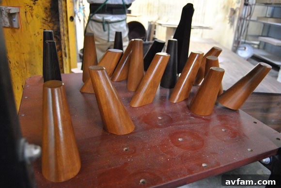 Painted furniture legs drying at Thrive Furniture factory