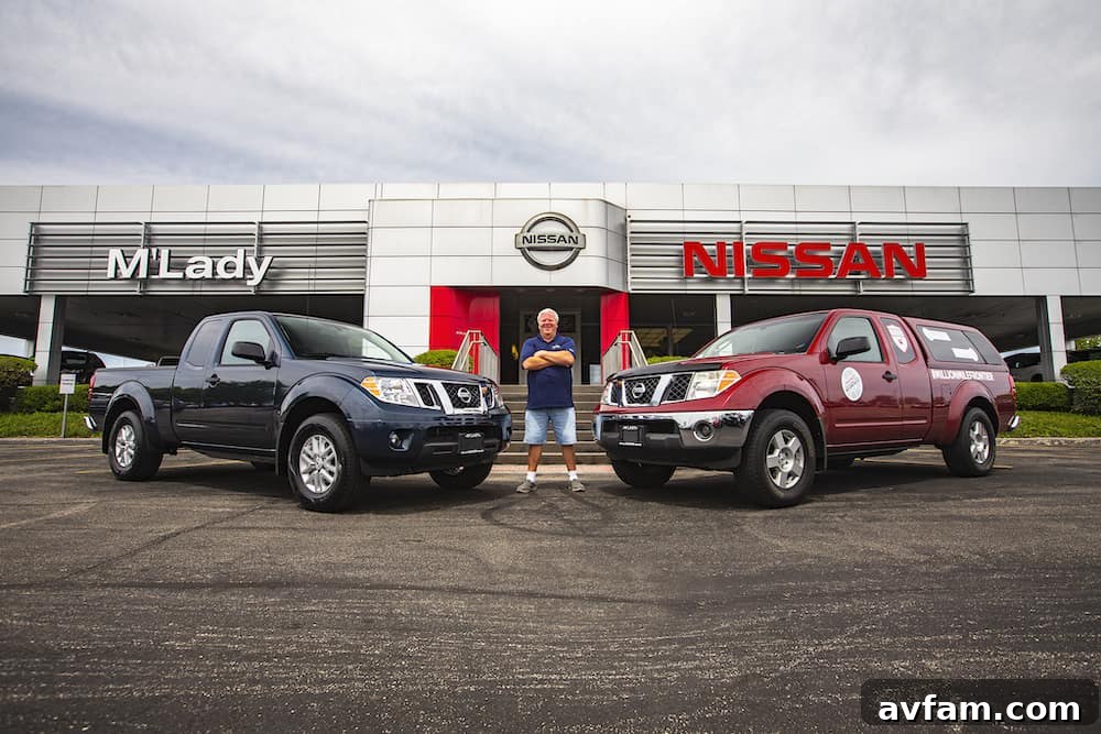 Brian Murphy, the proud owner of the million-mile Nissan Frontier, stands next to his well-traveled 2007 truck, sharing his incredible story of automotive endurance and dedication.