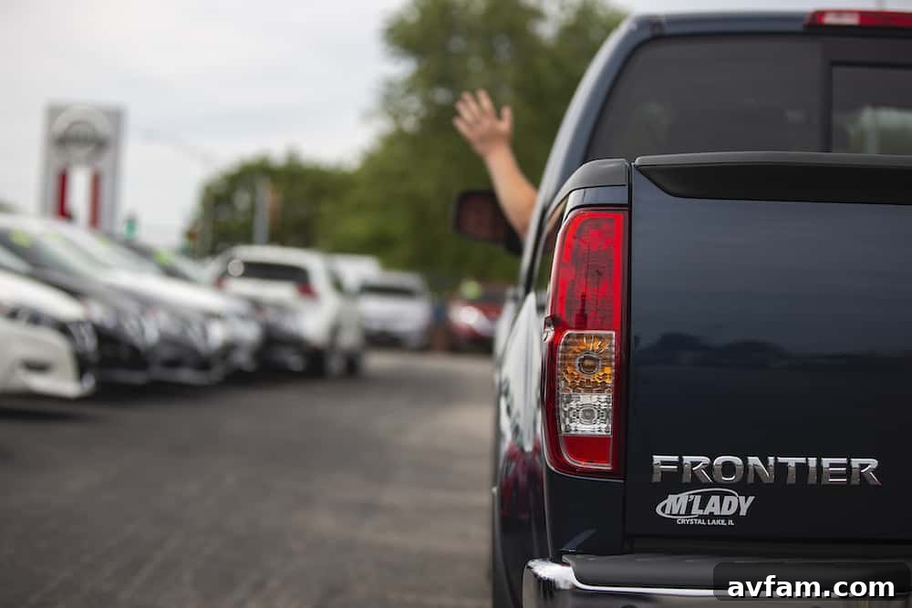 A side profile shot of the rugged 2020 Nissan Frontier King Cab, highlighting its dynamic lines and sturdy design, ready to tackle any challenge on or off the road.