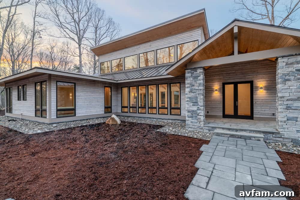Striking interplay of charred wood, glass, and geometric forms in a modern home.