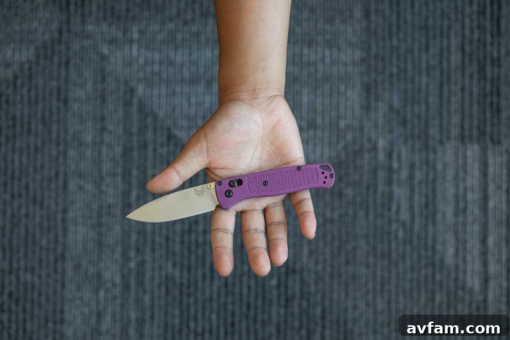 Benchmade Bugout knife with a blue G10 handle and contrasting blade, a popular custom configuration