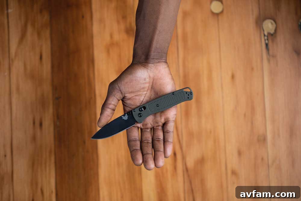 Benchmade Bugout knife with a vibrant yellow Grivory handle, perfect for high visibility and personal flair