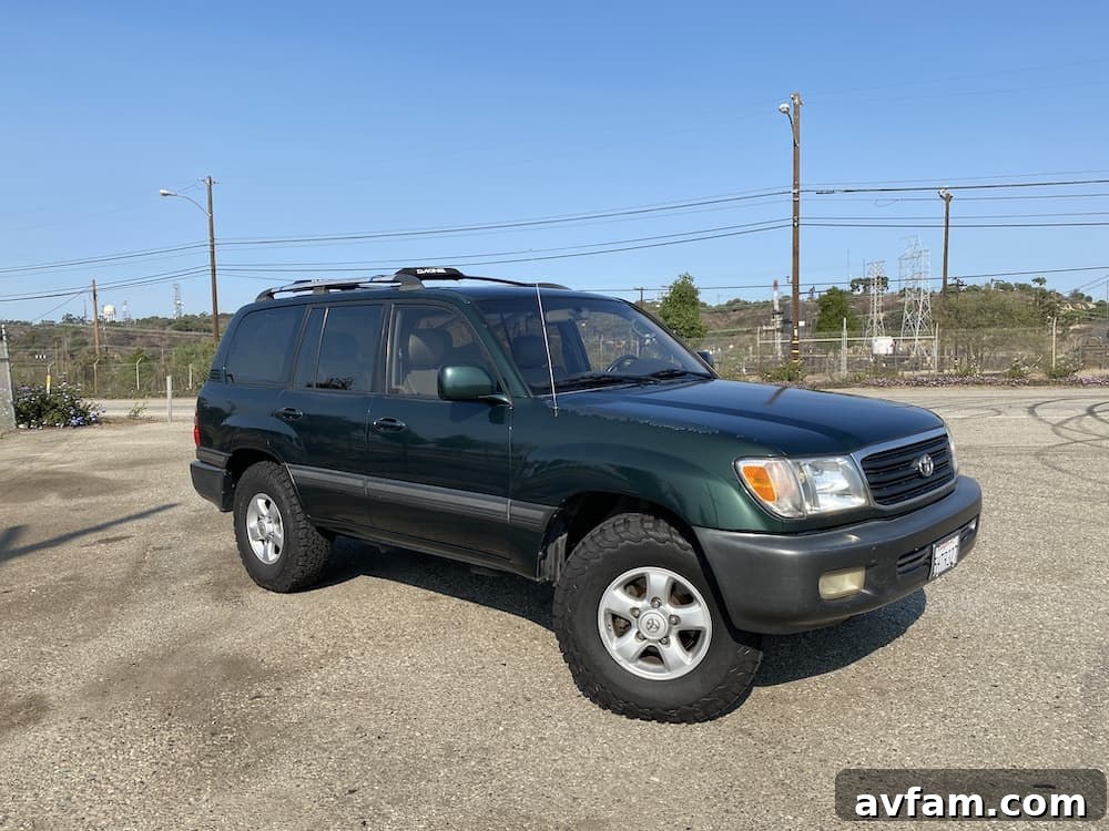 Side view of the green Toyota Land Cruiser 100 Series
