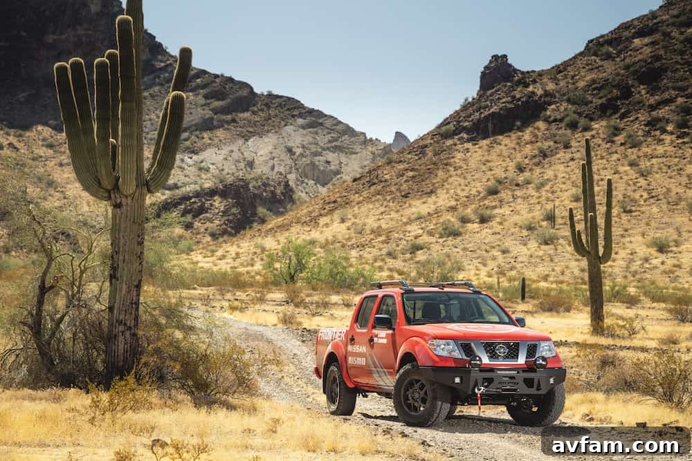 Nissan Frontier with Nismo off-road modifications in action
