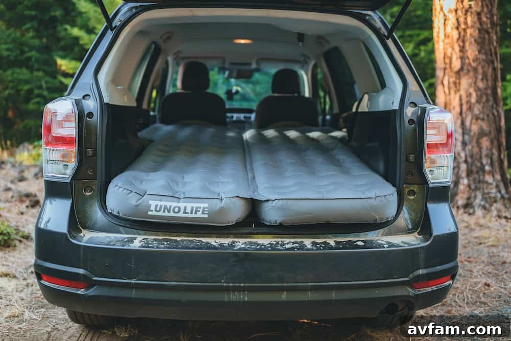 Luno Air Mattress perfectly fitting into the rear of a vehicle, showcasing its custom design for comfortable car camping