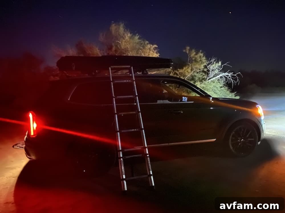 Campsite at night with Roofnest Sparrow on a Kia Telluride
