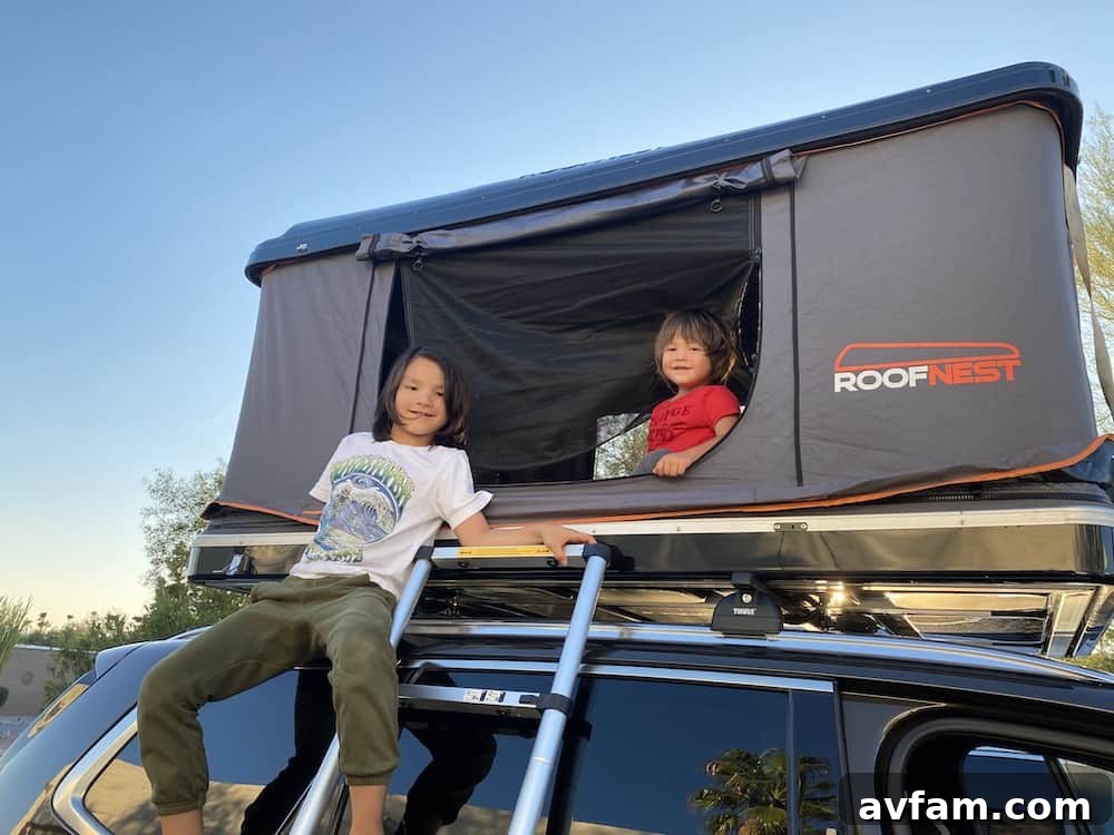 Roofnest Sparrow rooftop tent open with beautiful sunset background