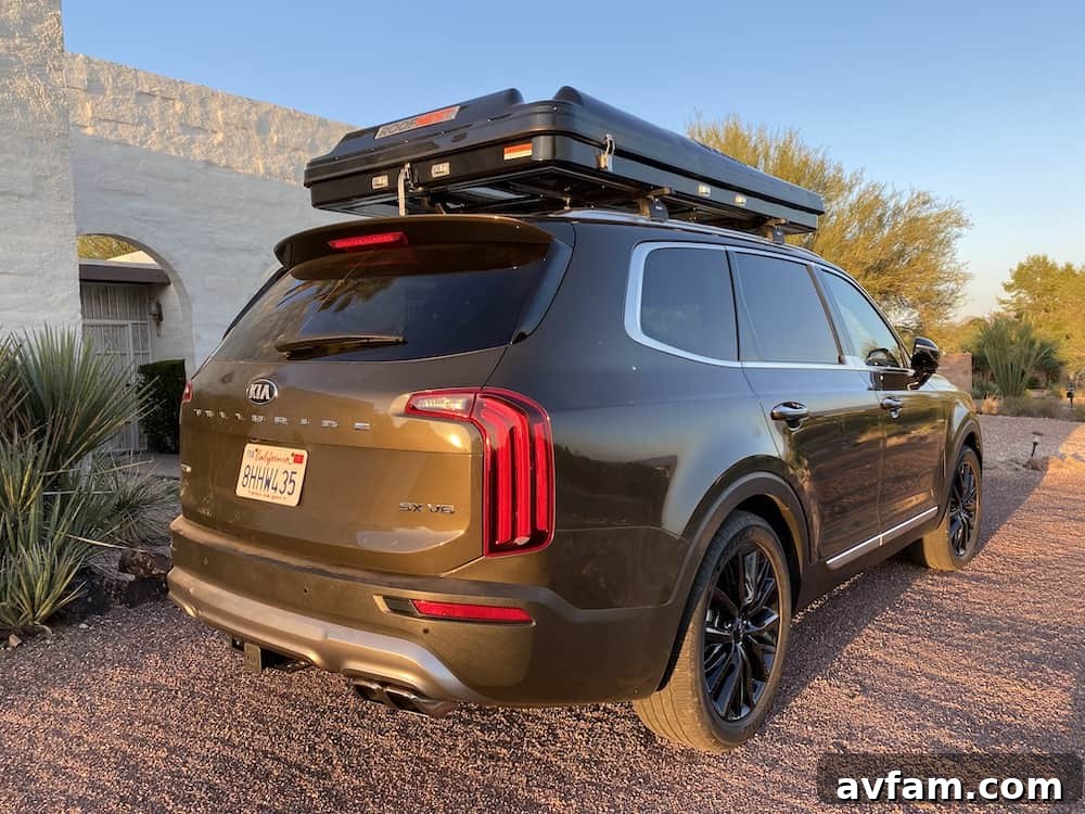 Roofnest Sparrow rooftop tent deployed on a vehicle in nature