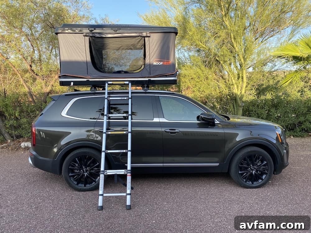 Campsite with Roofnest Sparrow on a Kia Telluride in daylight