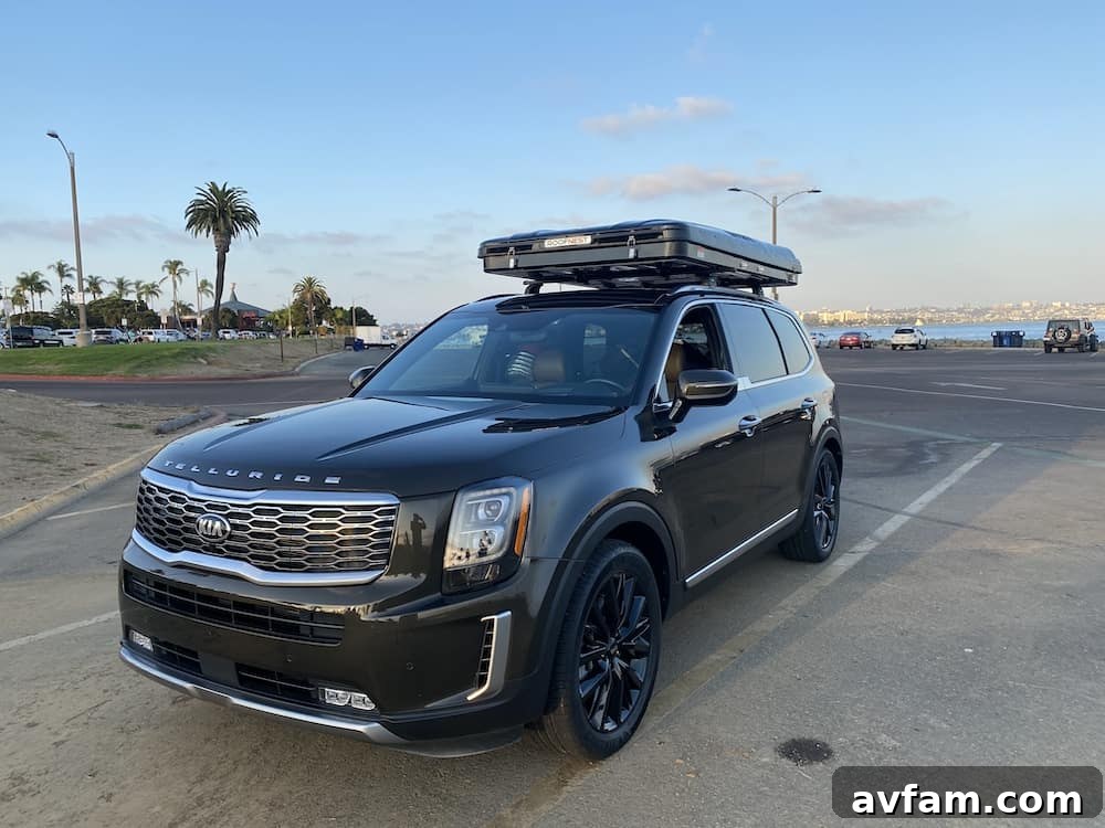 Overland vehicle with Roofnest Sparrow rooftop tent on an off-road track