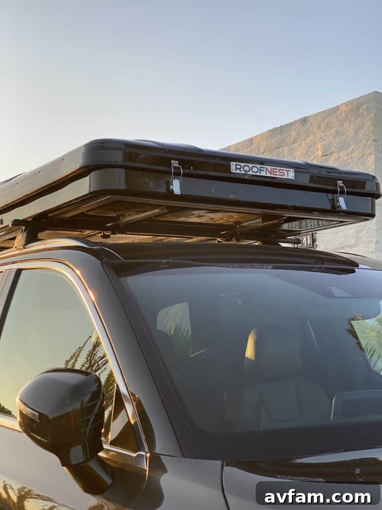 Roofnest Sparrow hard shell rooftop tent closed on top of a vehicle