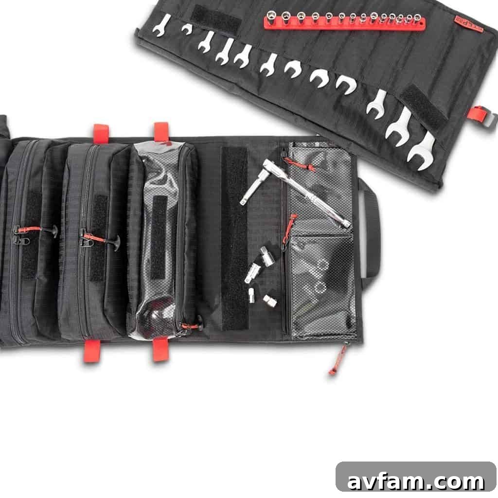 The Pangolin Tool Roll's interior showing the removable wrench roll and other pouches.