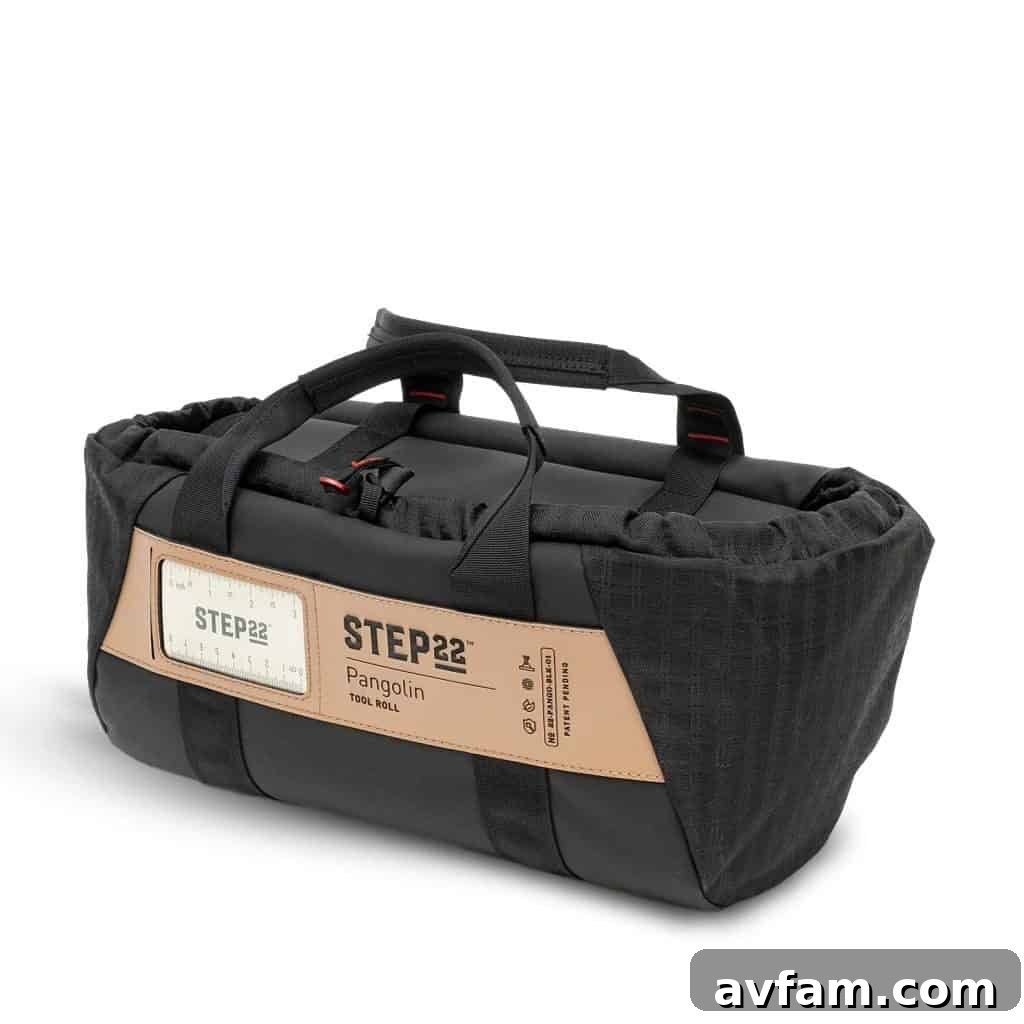 The Step 22 Pangolin Tool Roll unrolled, showing multiple internal pockets and pouches.