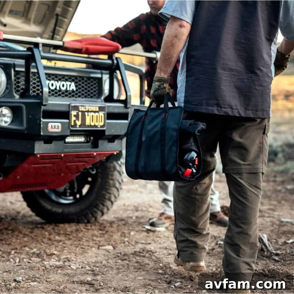 The Pangolin Tool Roll opened and laid out on a surface, showcasing its deployable storage garage feature.
