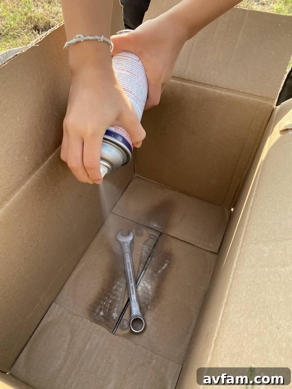 A close-up of the wrench showing a subtle, cloudy texture of the glow-in-the-dark Plasti Dip before it glows.