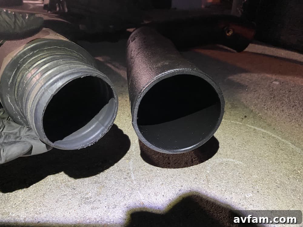 K&N vs. Factory Intake Tube Diameter Side-by-side comparison of the wider K&N intake tube and the narrower factory tube.