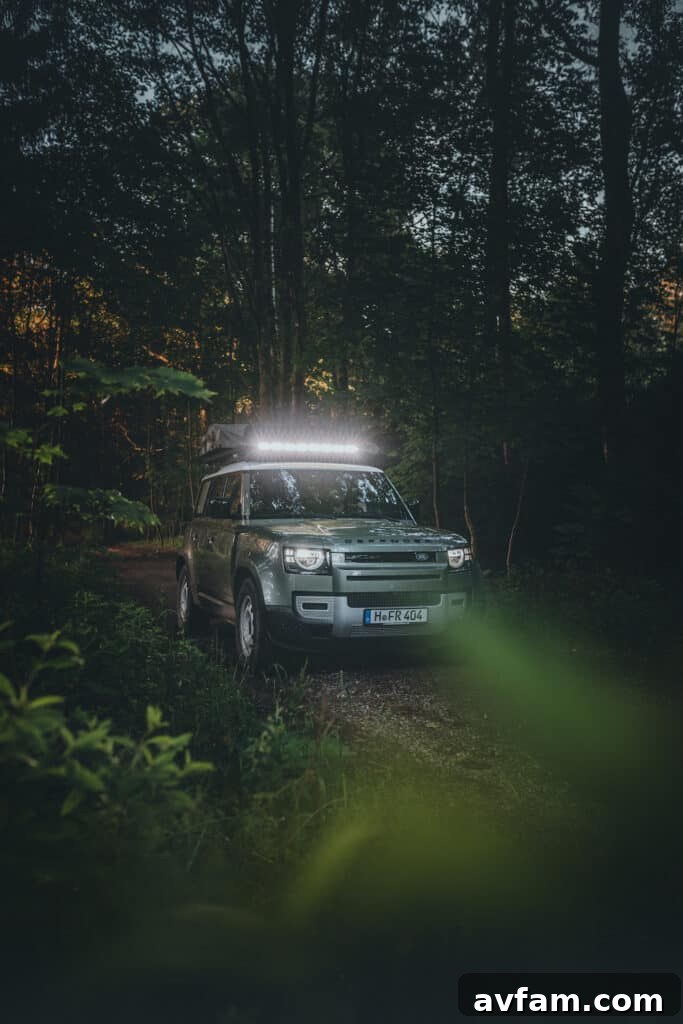 Detailed view of Front Runner Slimline II roof rack on Defender