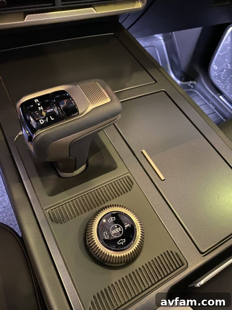 Passenger side view of the Hummer EV interior, highlighting the wide cabin.