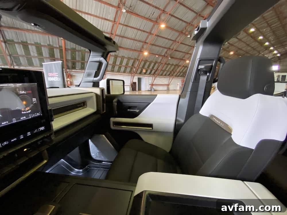 Spacious rear seating area of the GMC Hummer EV.