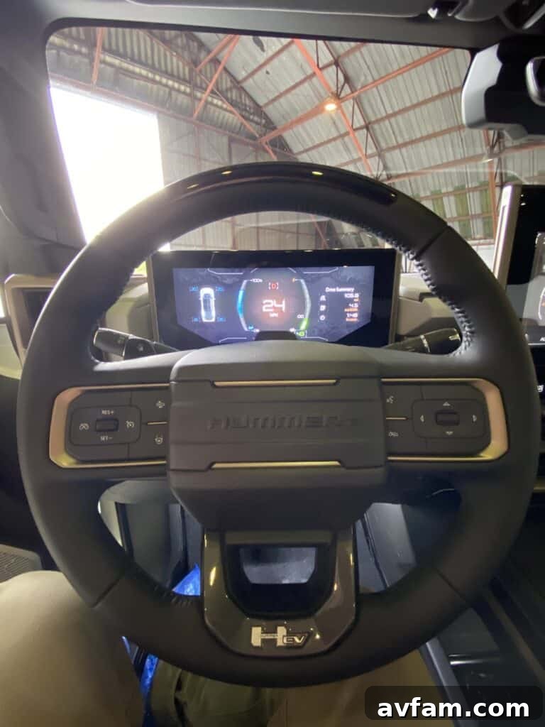 Close-up of the Hummer EV's climate controls and central console.