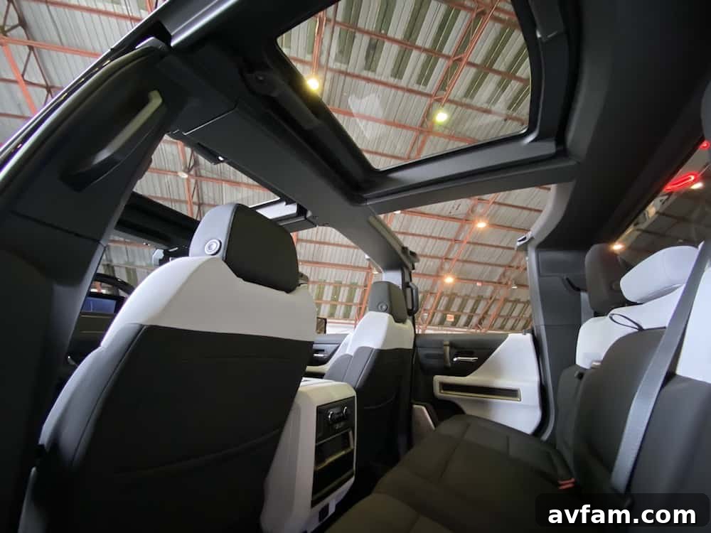 The open-air cabin of the GMC Hummer EV, emphasizing its spaciousness.