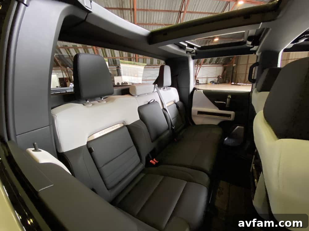 View of the Hummer EV's dash and infotainment screens without the roof panels.