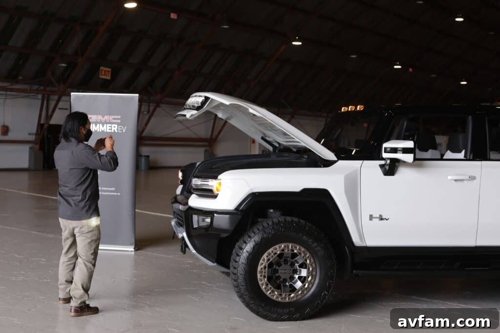 The GMC Hummer EV's robust rear bumper and integrated lighting.