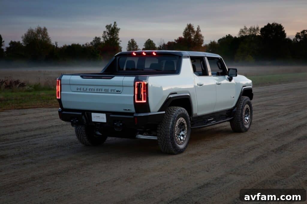 The GMC Hummer EV's powerful stance from a low angle.