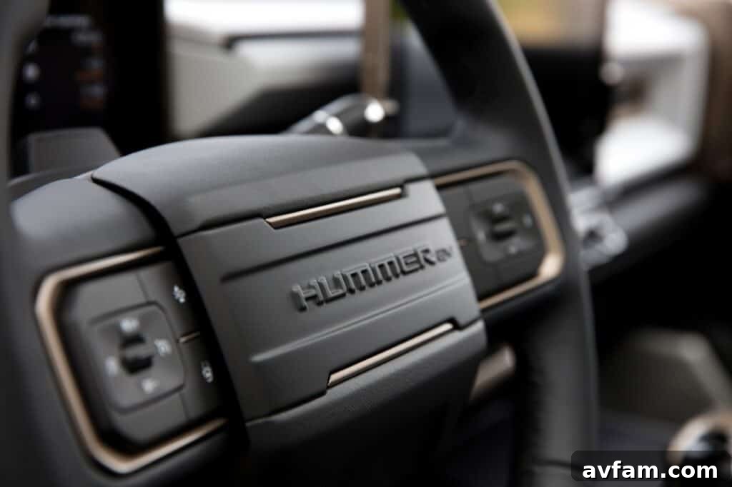 Detail of the GMC badge and LED lighting on the Hummer EV.