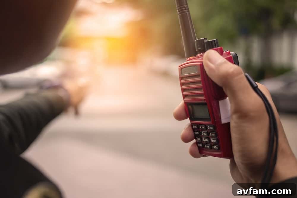 Two overlanders using FRS/GMRS walkie-talkies during an outdoor adventure