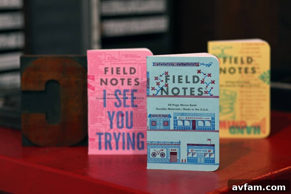 Field Notes Letterpress Collection An arrangement of multiple Field Notes memo books from the United States of Letterpress edition, showcasing the varied designs and colors of the letterpress covers.