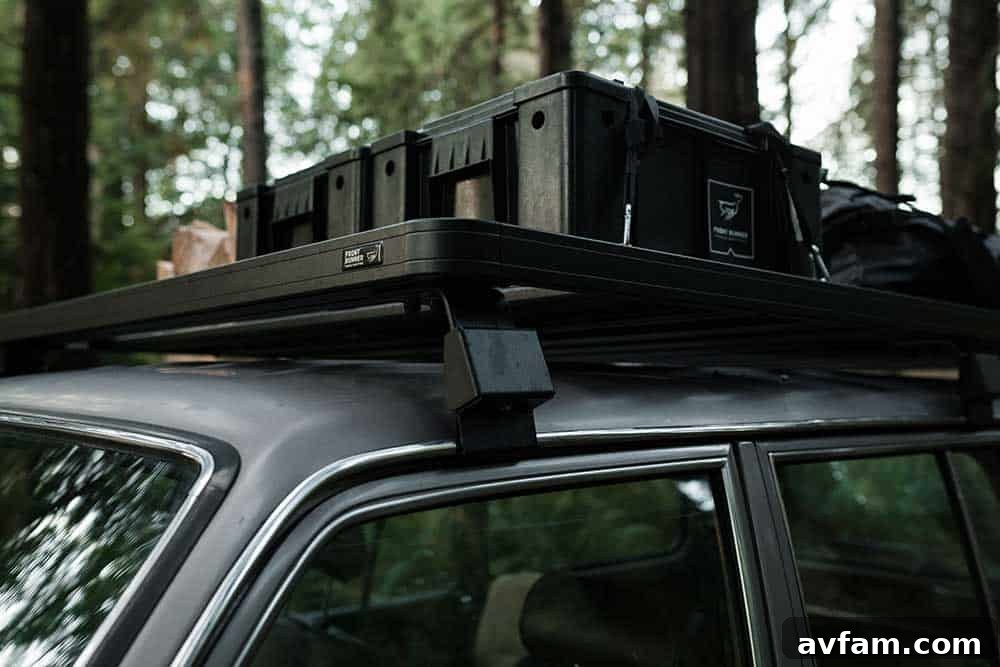 Front Runner Wolf Pack storage boxes secured to a Slimline II roof rack
