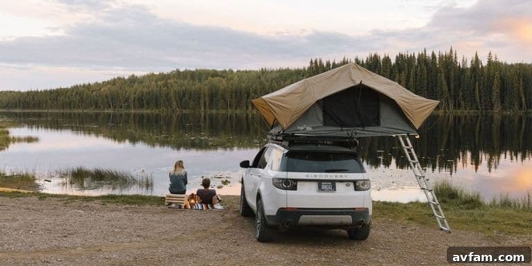 Front Runner Slimline II Roof Rack with a rooftop tent and side mounted shovel