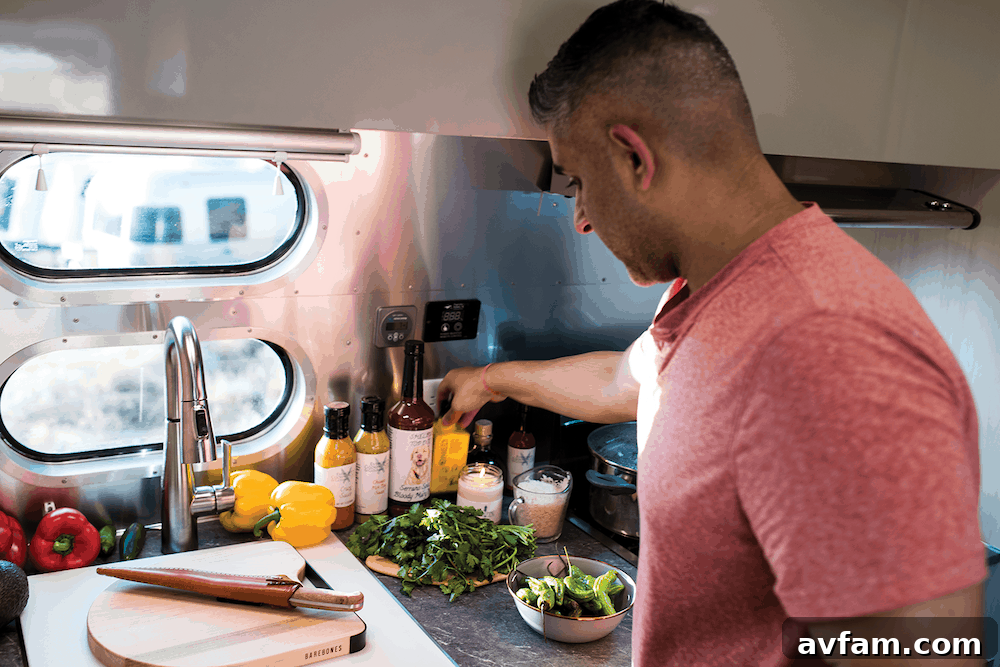 Rear interior view of the Airstream Flying Cloud 30FB Office, showcasing the office area and the spaciousness of the trailer.