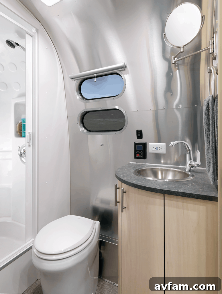 Close-up of the pull-out table feature in the Airstream Flying Cloud 30FB Office, demonstrating flexible workspace expansion.