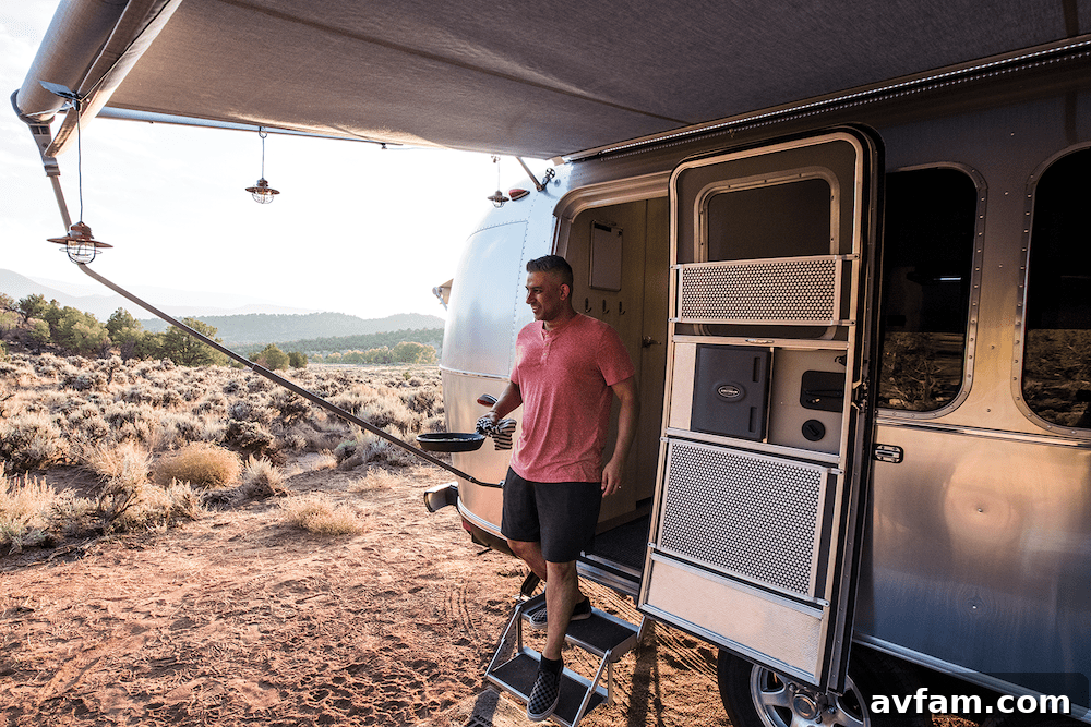 Detailed interior view of the Airstream Flying Cloud 30FB Office, showcasing the modern design and functional office setup with windows.