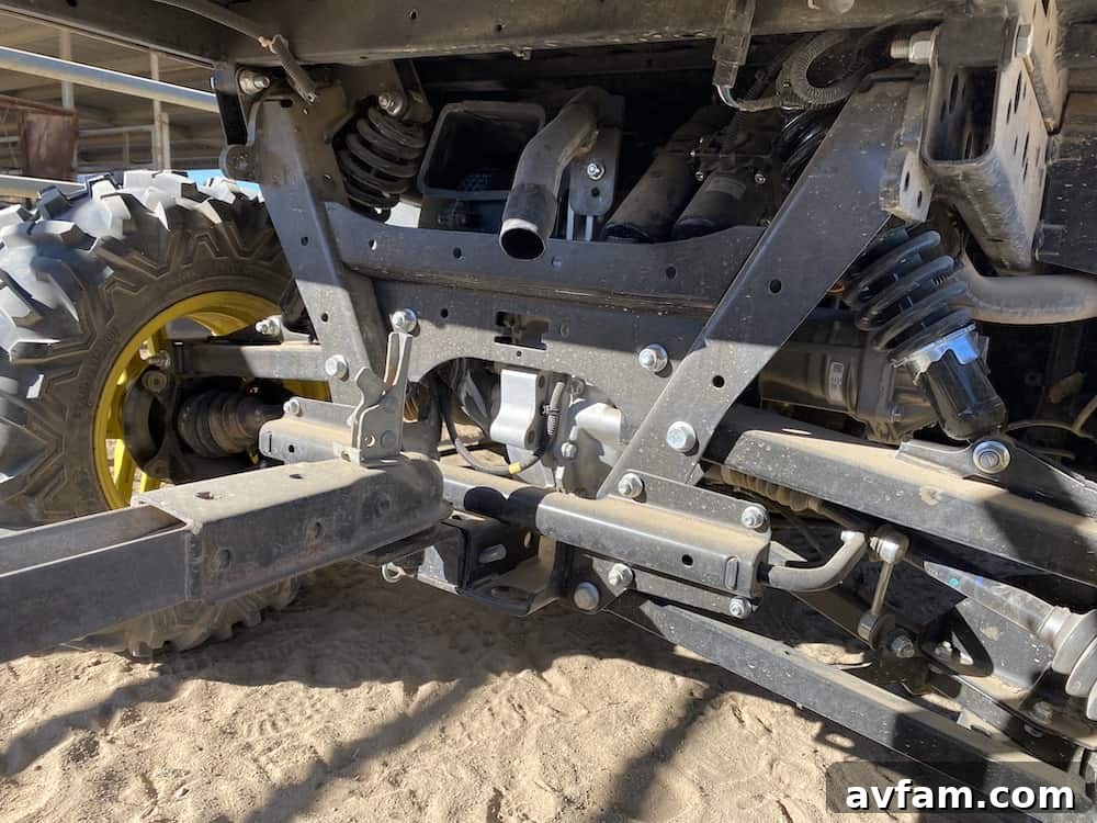 Rear view of the John Deere Gator XUV865M, showing its cargo bed