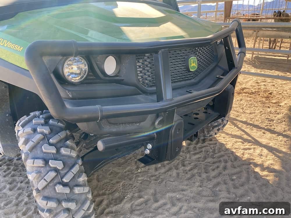 Rear view of John Deere Gator XUV865M cargo bed, ready for attachments