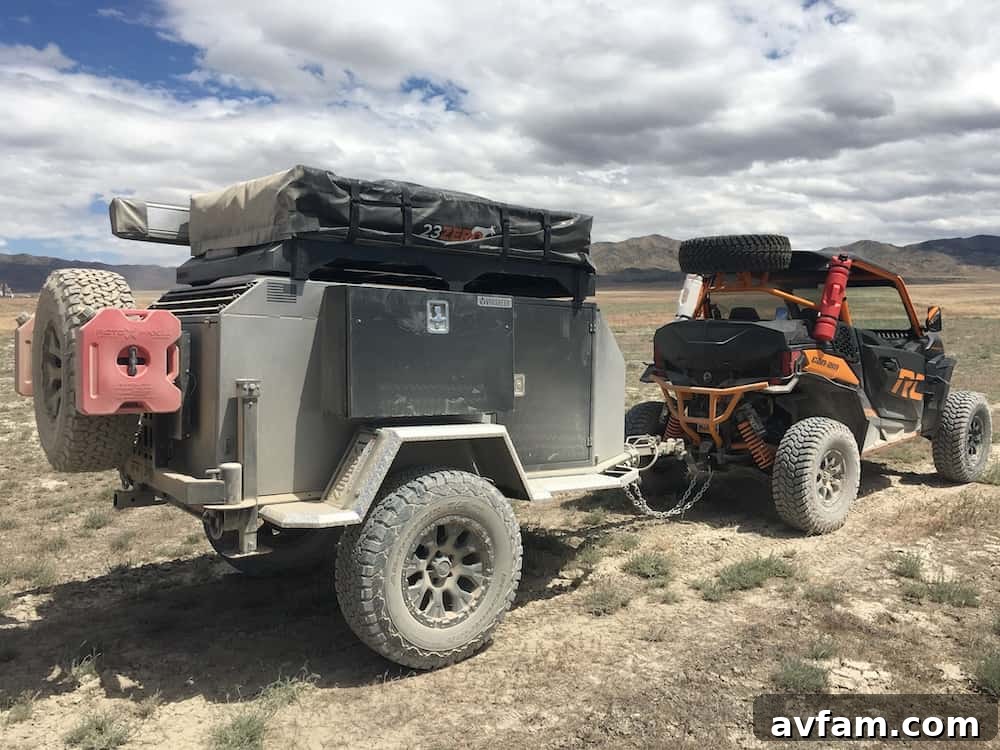 Rear view of the Vorsheer XOC, highlighting storage and a rooftop tent setup