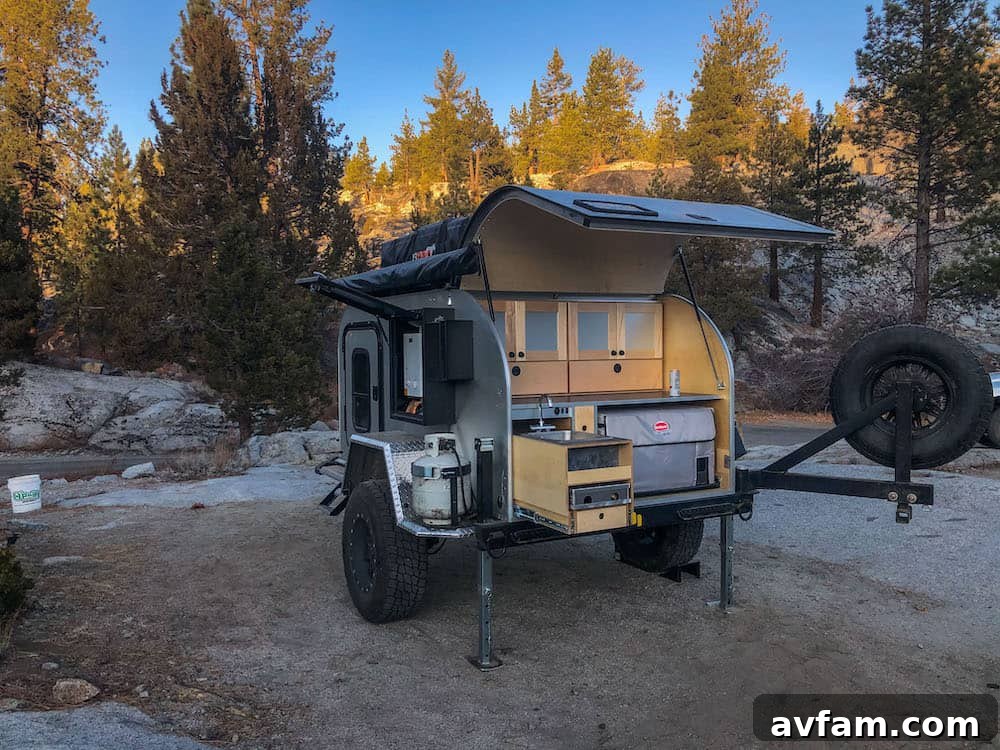 Side view of the Vorsheer XOC trailer, emphasizing its robust construction and high clearance