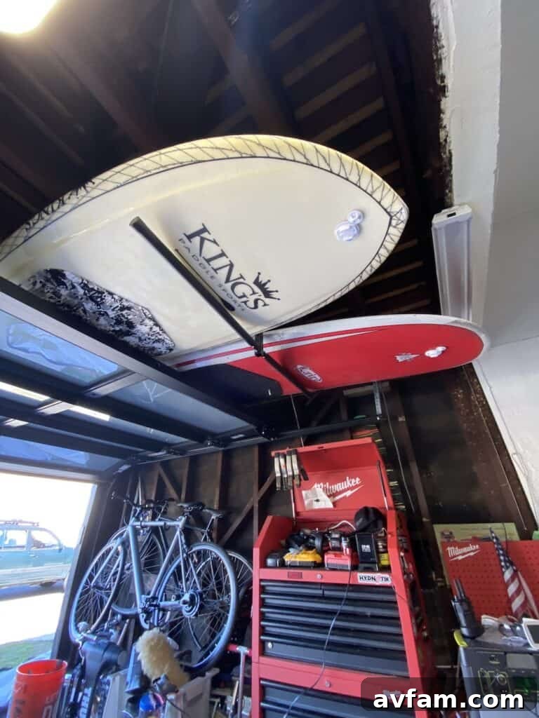 A perspective shot of the garage showing the surfboard rack integrating seamlessly with the ceiling