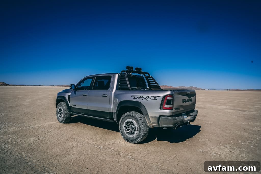 TRX Off-Road Tires Ram TRX driving on a rugged trail, highlighting its off-road tires.