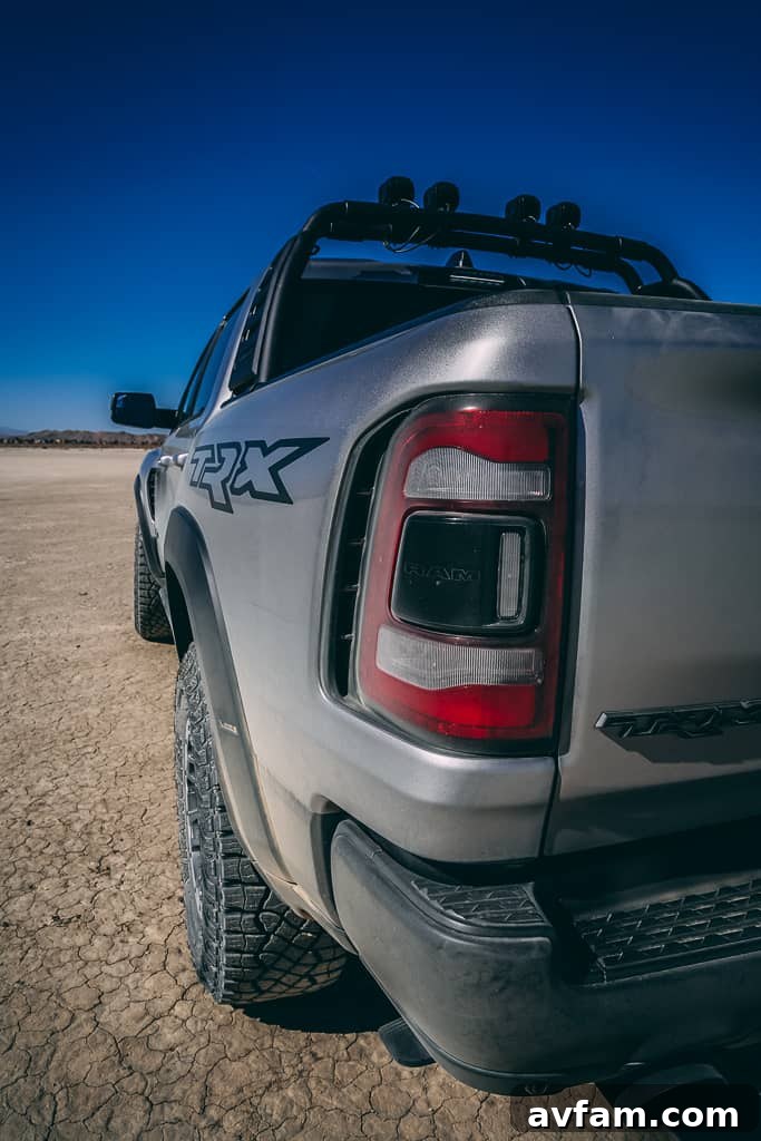 TRX Powerful Stance Ram TRX front quarter view, parked against a wall, highlighting its powerful stance.