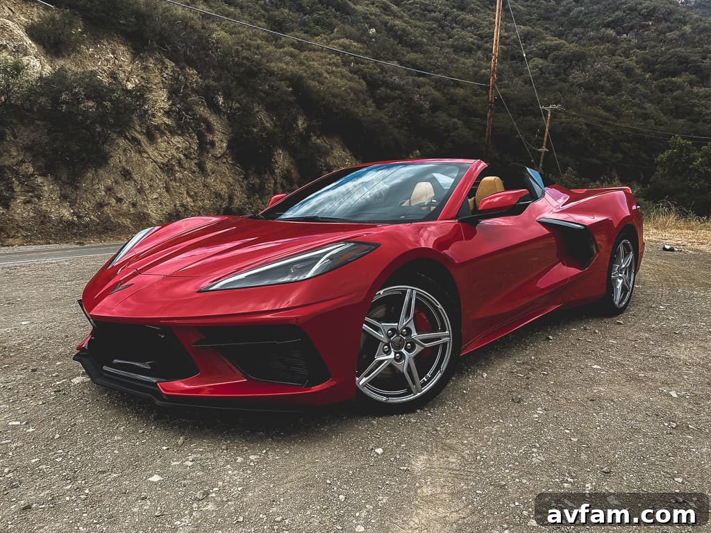The C8 Convertible parked majestically, highlighting its low-slung profile and wide stance.