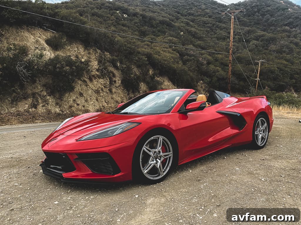 Front-three-quarter view of the C8 Convertible, showcasing its sharp headlights and aerodynamic lines.