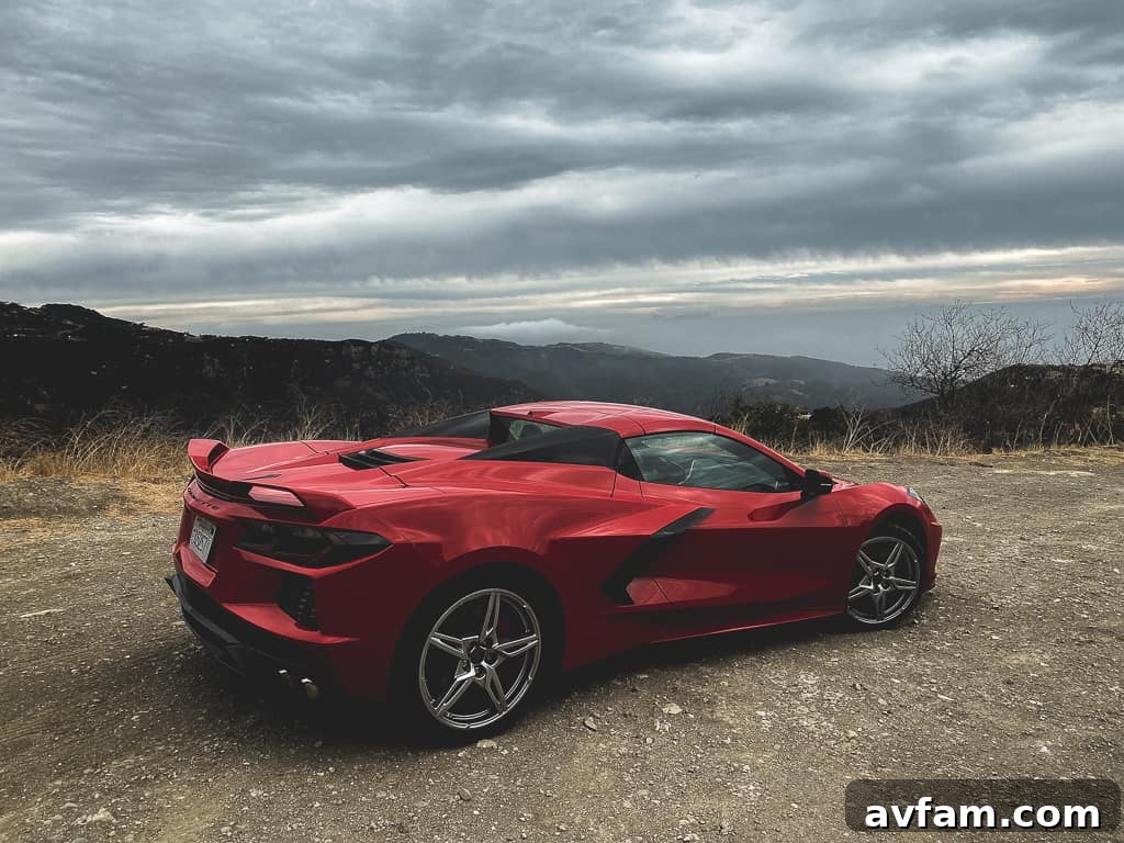 The C8 Convertible on a straight road, highlighting its aerodynamic design and speed.