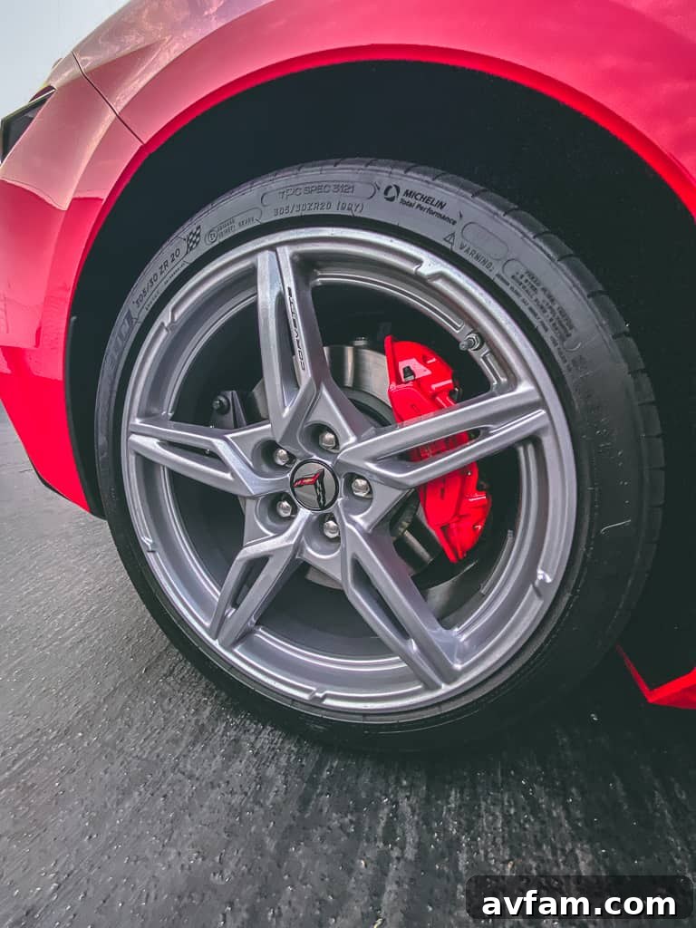 Detailed shot of the driver's area, including the steering wheel and paddle shifters in the C8 Convertible.